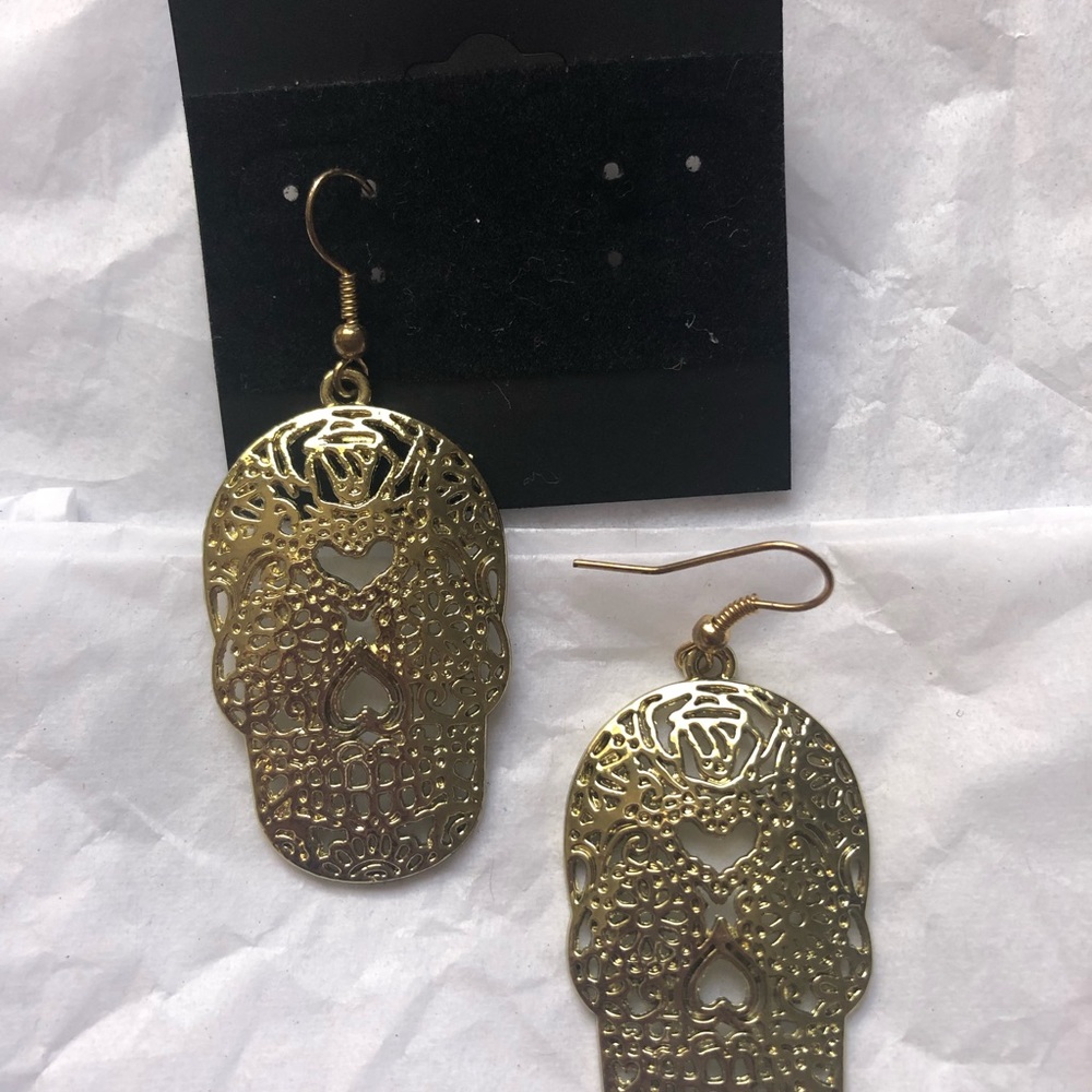 Gold skull earrings